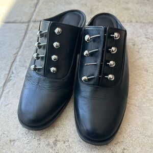 Rebecca Minikoff size 6 gently worn one silver button is missing.